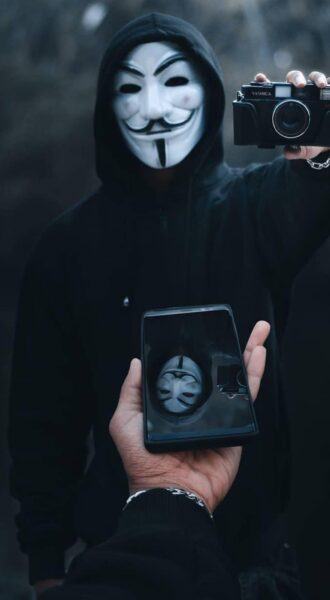 Hình ảnh Hacker, Anonymous và chiếc máy ảnh
