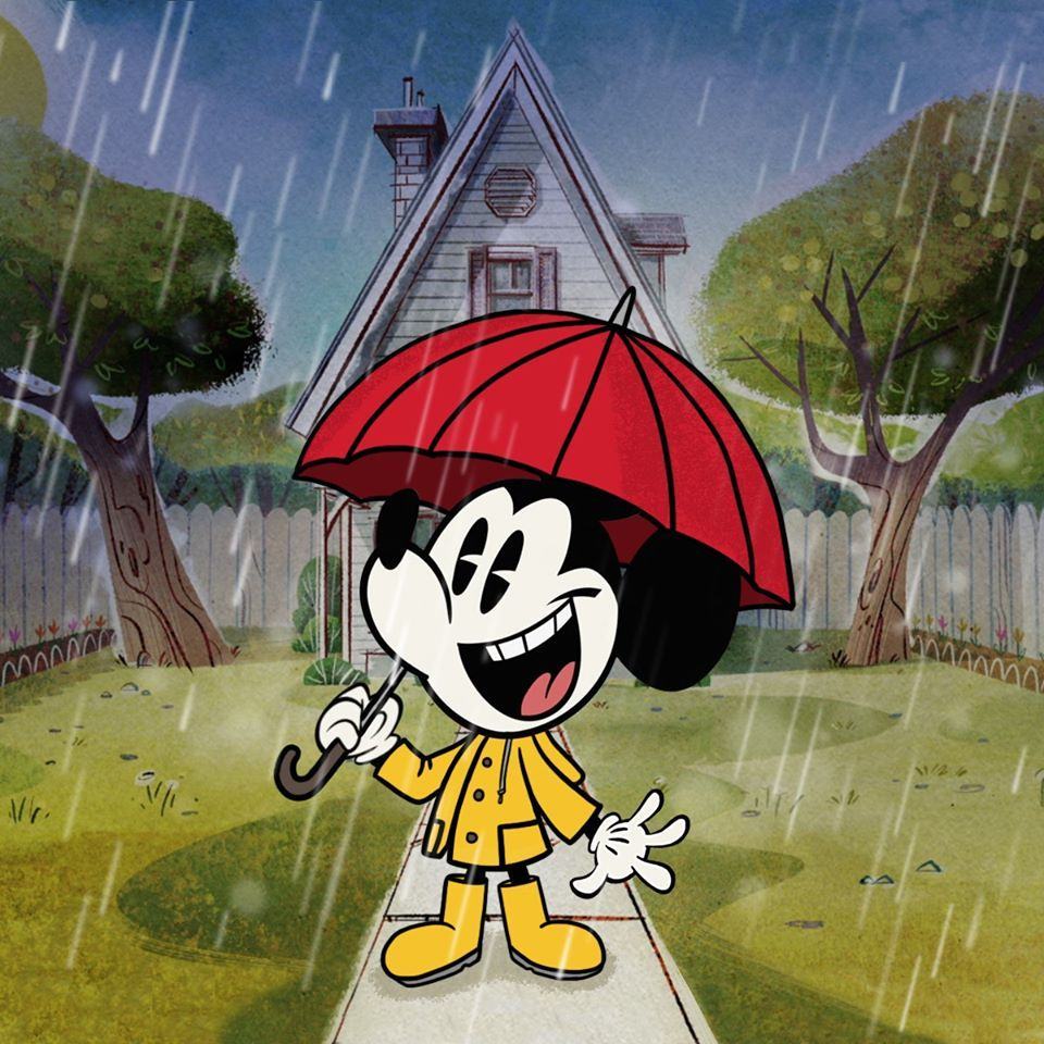 Chuột Mickey vui vẻ đứng dưới mưa