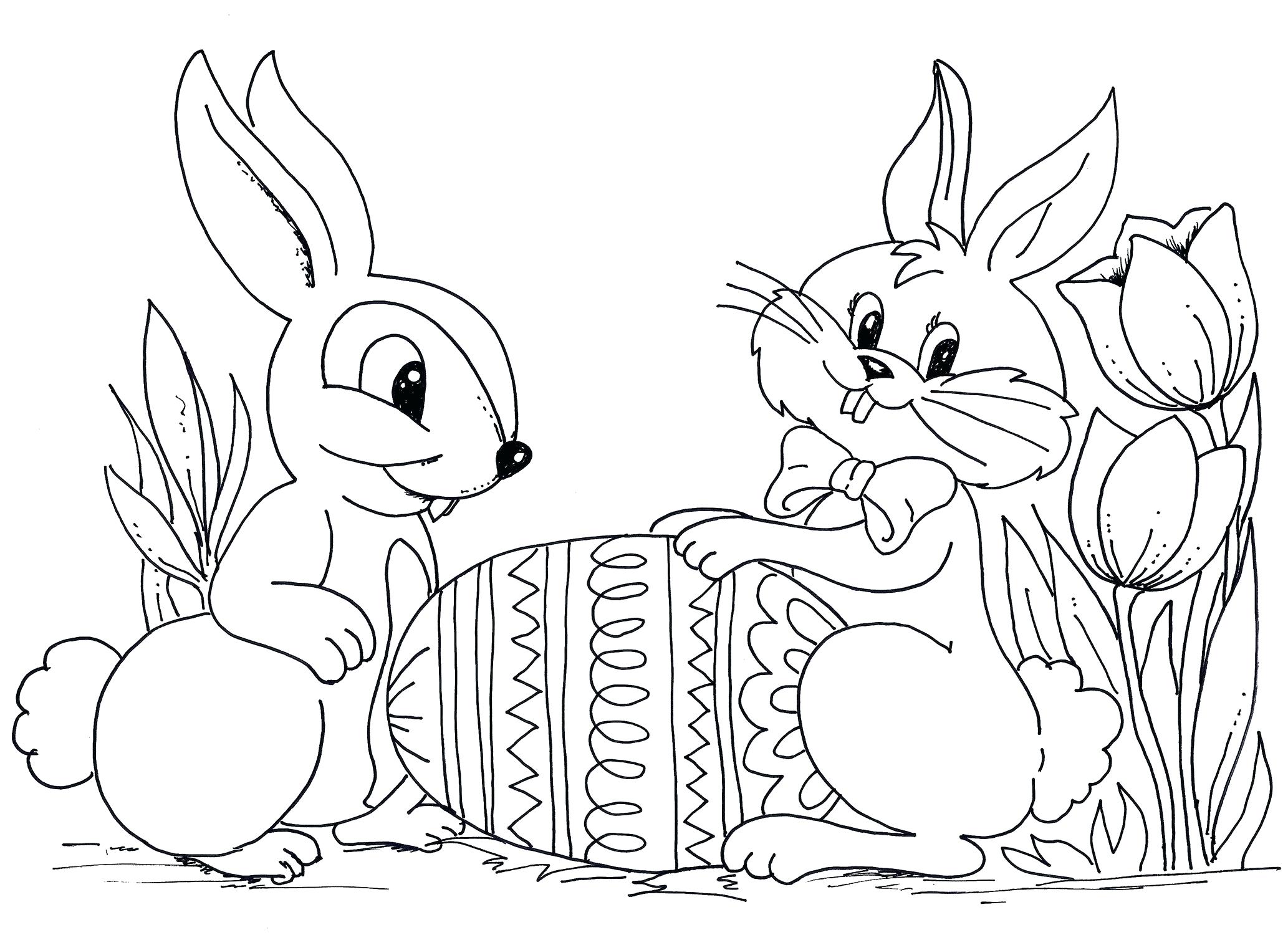 Tranh tô màu chú thỏ đứng bên trái quả trứng
