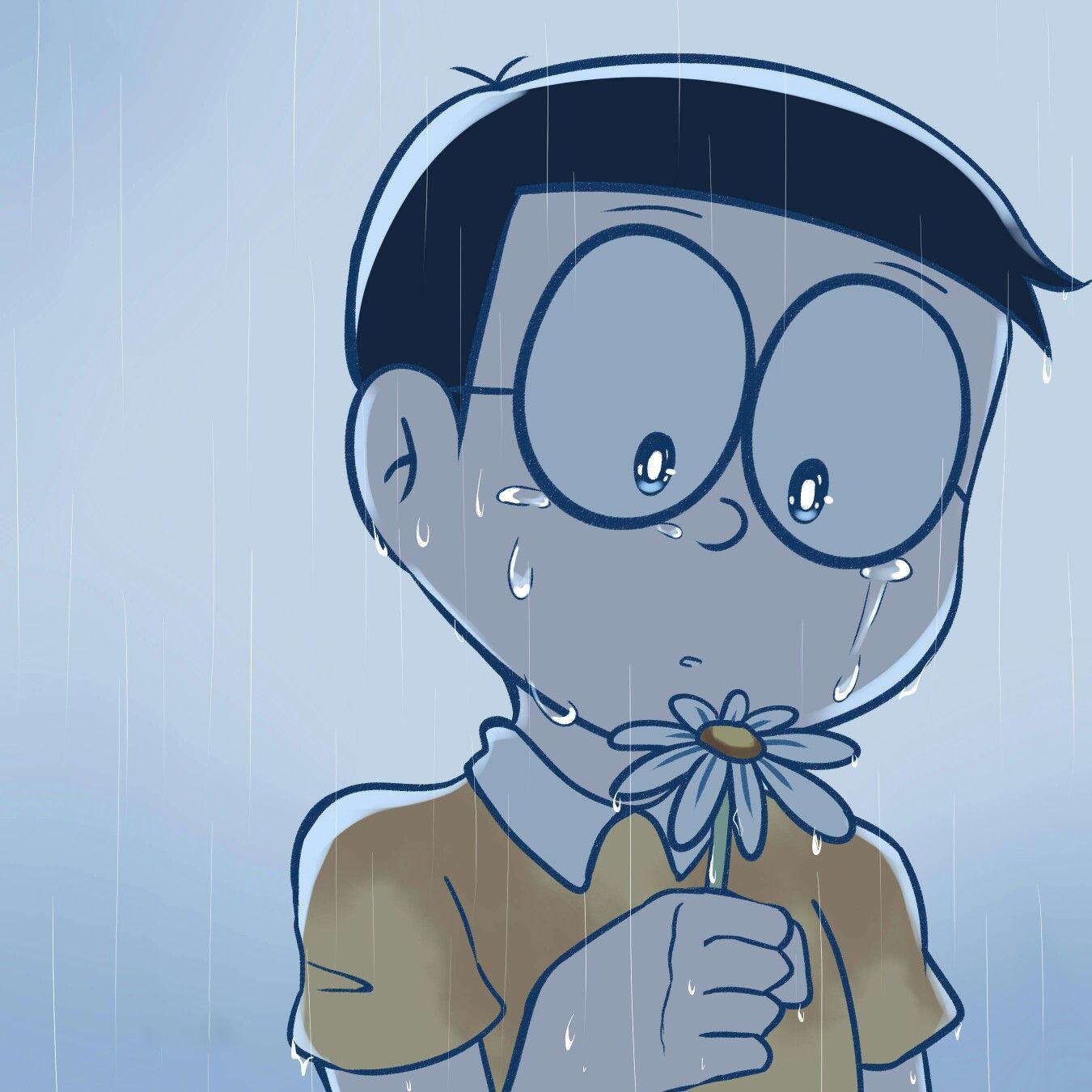 Hình nobita buồn dưới mưa