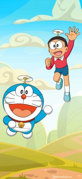 Hình ảnh Nobita và Doraemon bay cùng cối xay gió bằng tre