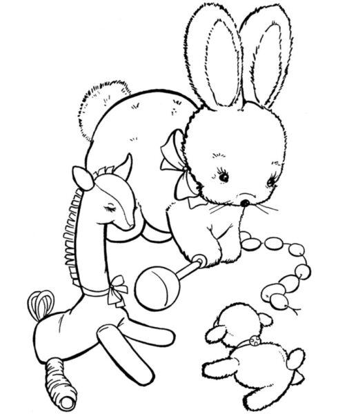 Tranh tô màu con thỏ chơi đồ chơi